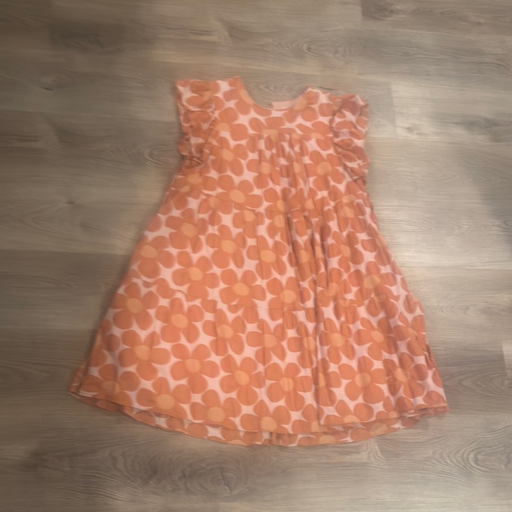 Orange ruffle sleeve dress